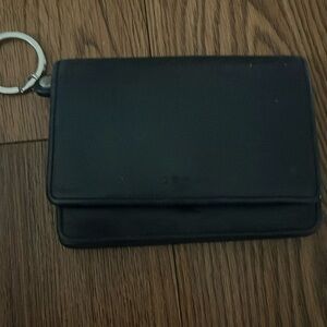 Genuine leather small wristlet wallet.